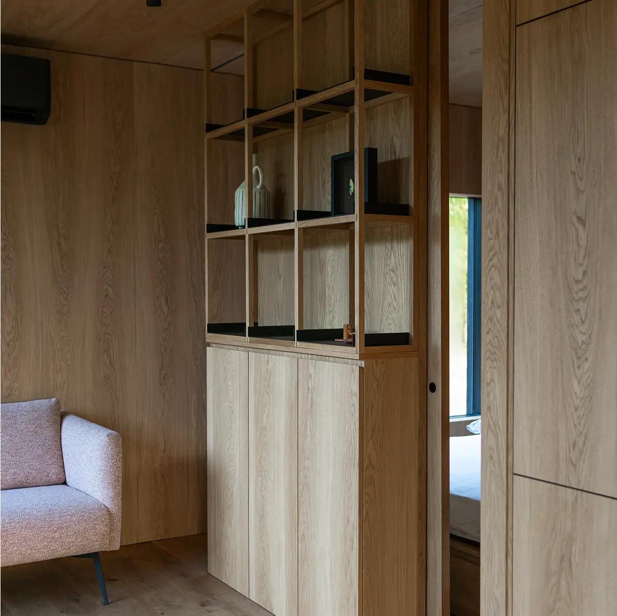 Oak shelving and cabinetry inside a KONGA cabin at Eco by Nature